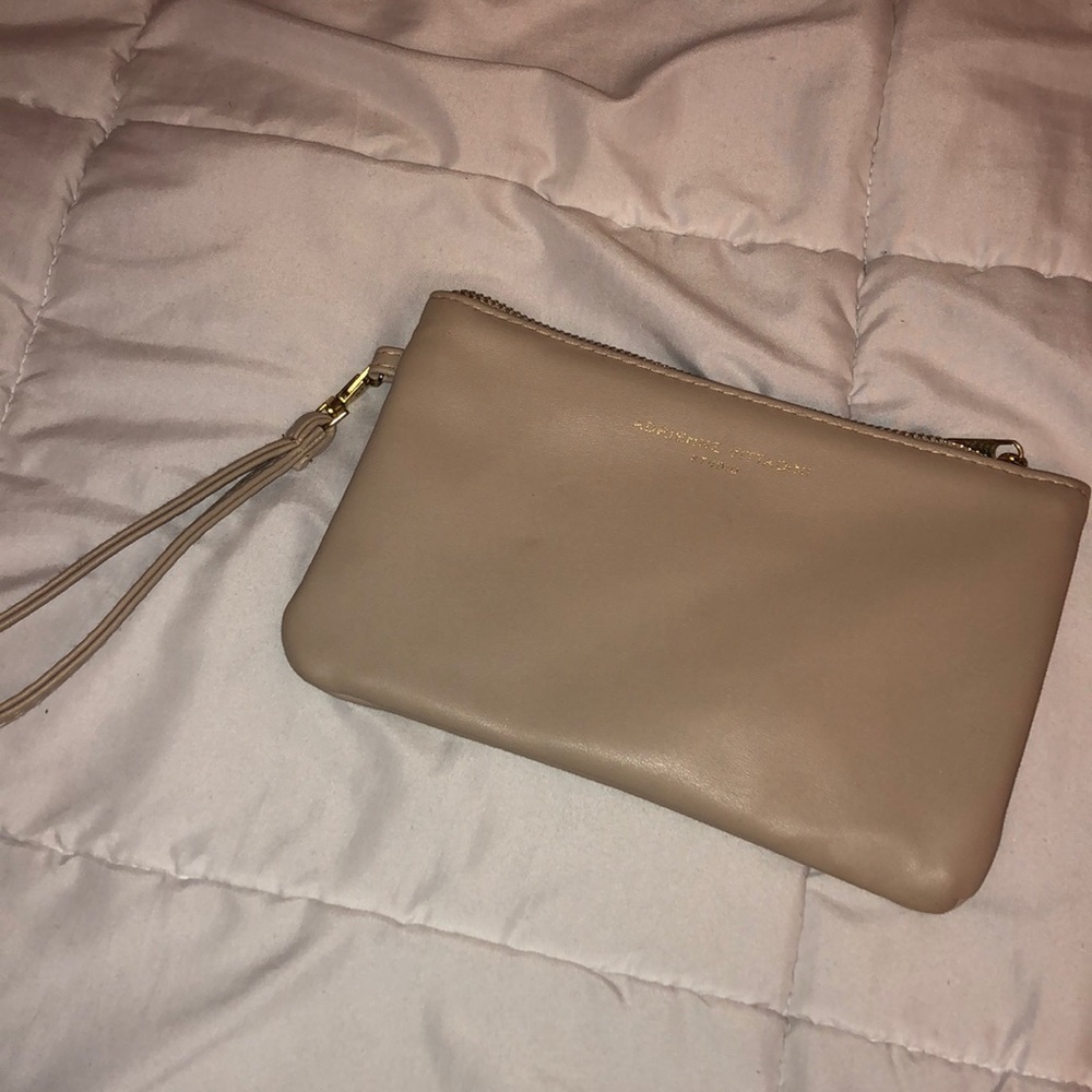 Wristlet with connected Portable Charger